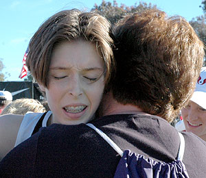 Winner Aislinn Ryan gets hugs from her parents Pat and Colin Ryan. - ryanandmom